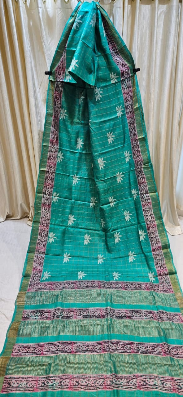 Handloom Tussar silk saree with butti motifs and traditional woven border
