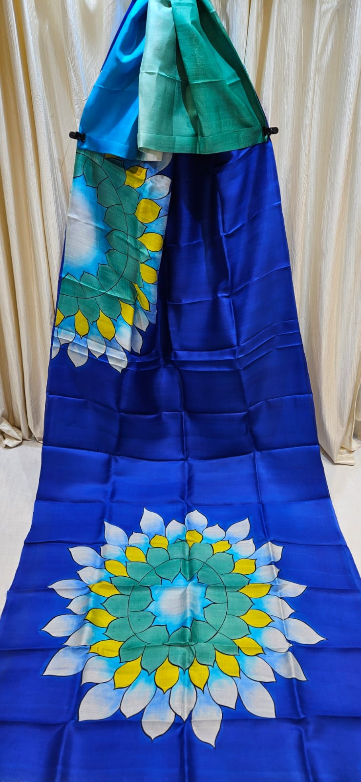Pure Katan silk royal blue saree with hand-painted lotus design, premium festive and wedding wear saree
